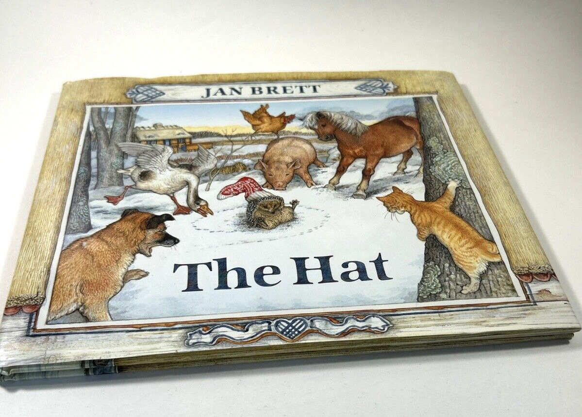 The Hat by Jan Brett ~ HCDJ ~ Near Fine First Edition and First Impression 1997