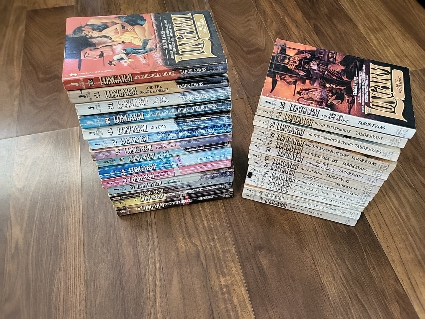Lot Of 27 Pb Longarm Books Tabor Evans