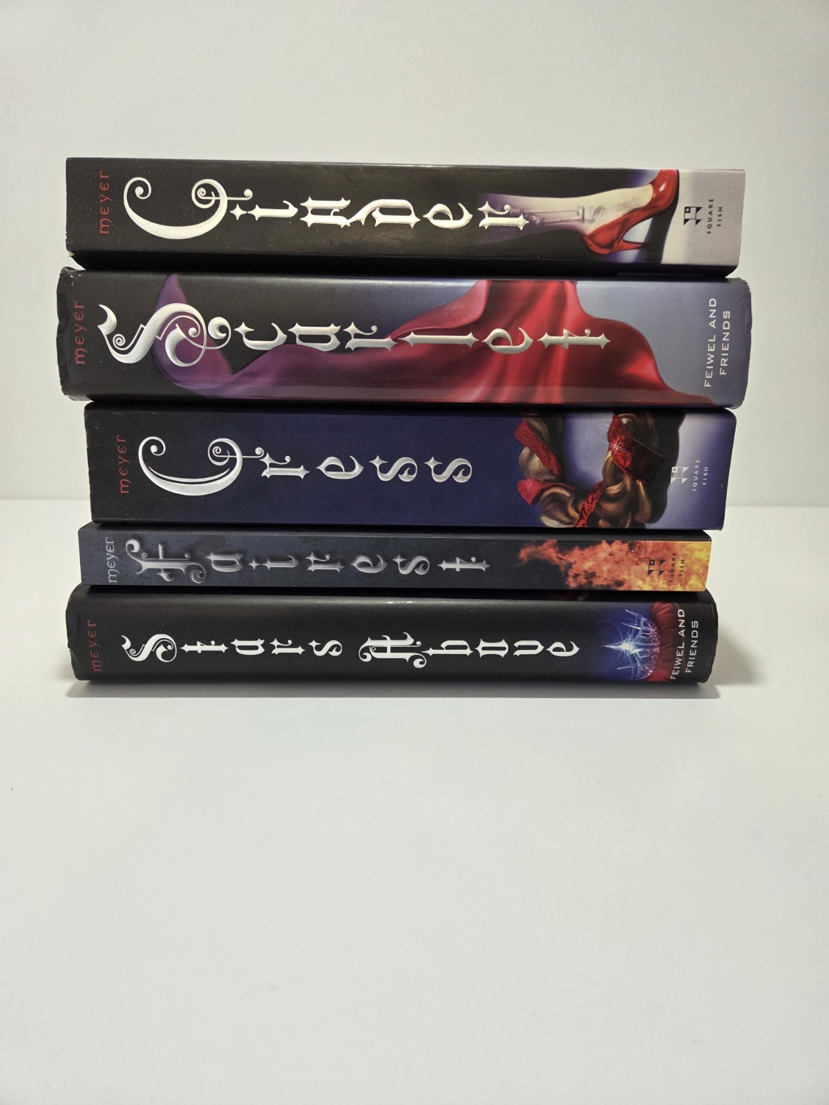 The Lunar Chronicles by Marissa Meyer 5 books – 3 HB, 2 PB (missing Winter)