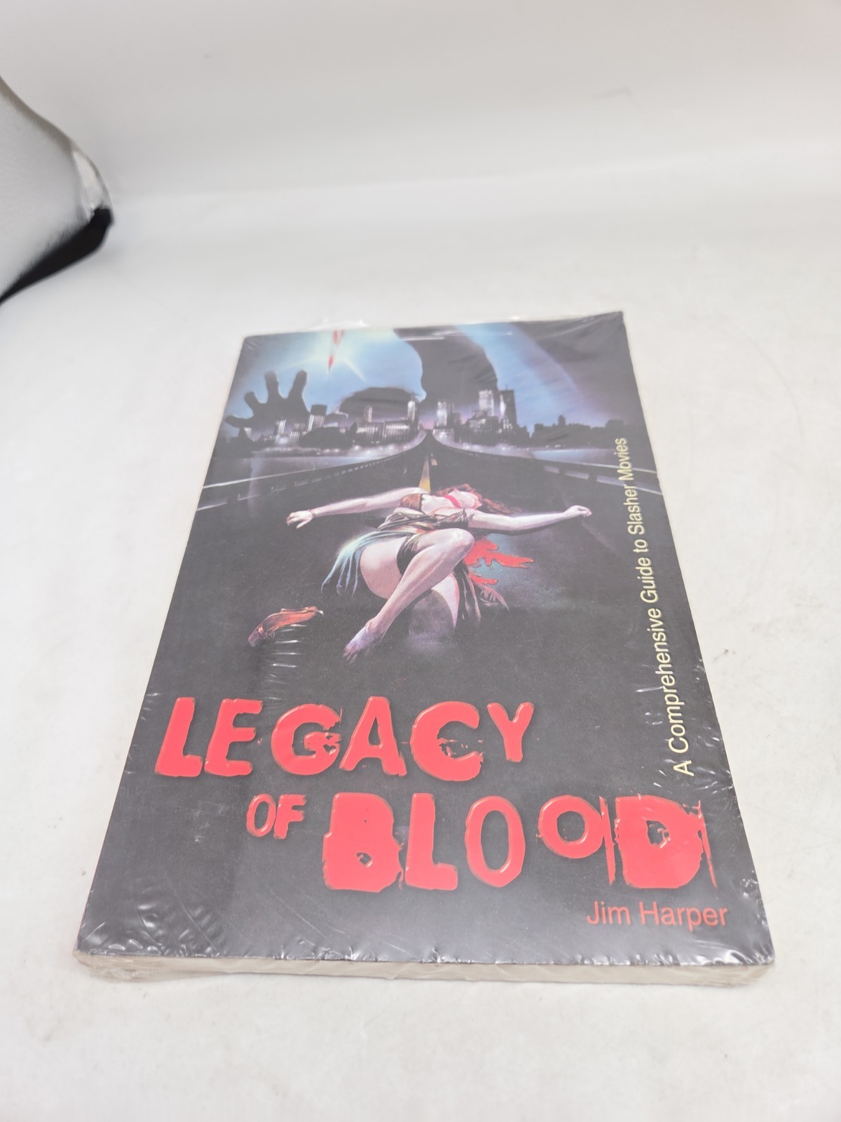 LEGACY OF BLOOD: A COMPREHENSIVE GUIDE TO SLASHER MOVIES – Jim Harper, Paperback