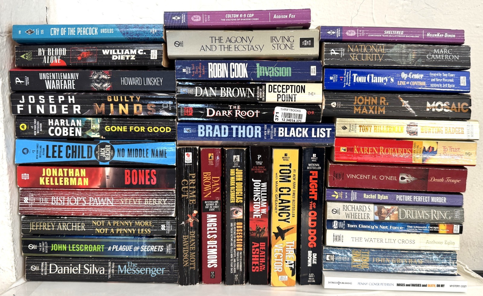Lot of; 36 Paperback Thrilller/ Intrigue Novels.