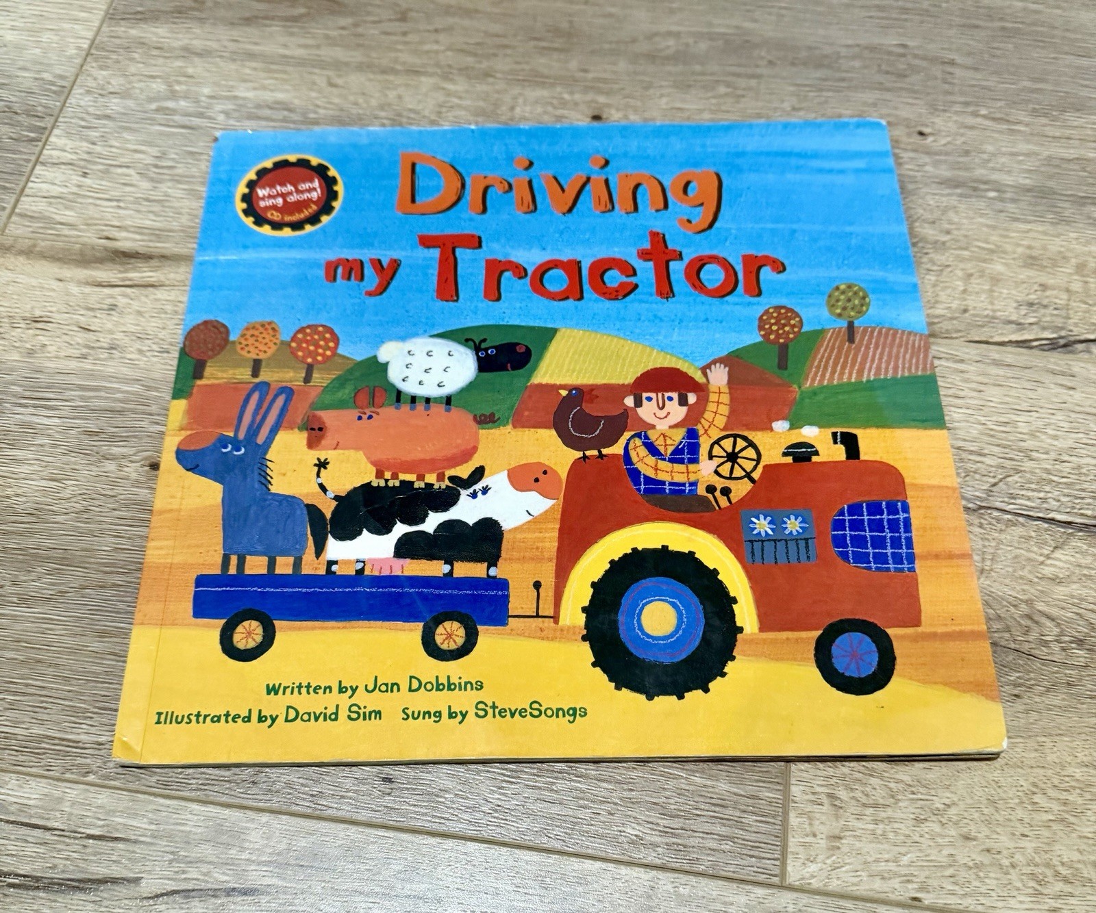 DRIVING MY TRACTOR A BAREFOOT SINGALONG) By Jan Dobbins & David Sim