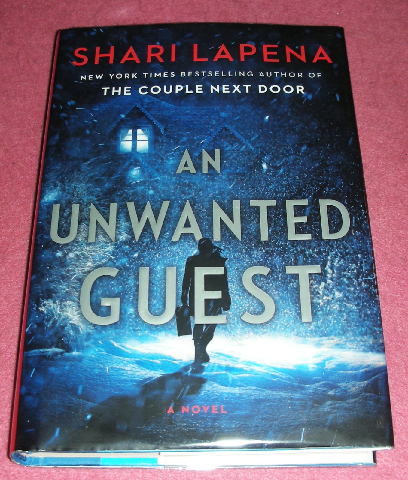 AN UNWANTED GUEST by Shari Lapena 2018 HC/DJ ~ 1st Edition, 1st Print + Cover