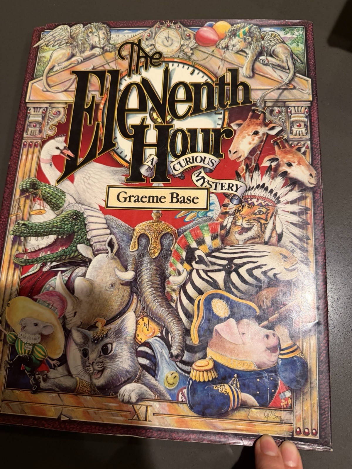 The Eleventh Hour: A Curious Mystery by Graeme Base.