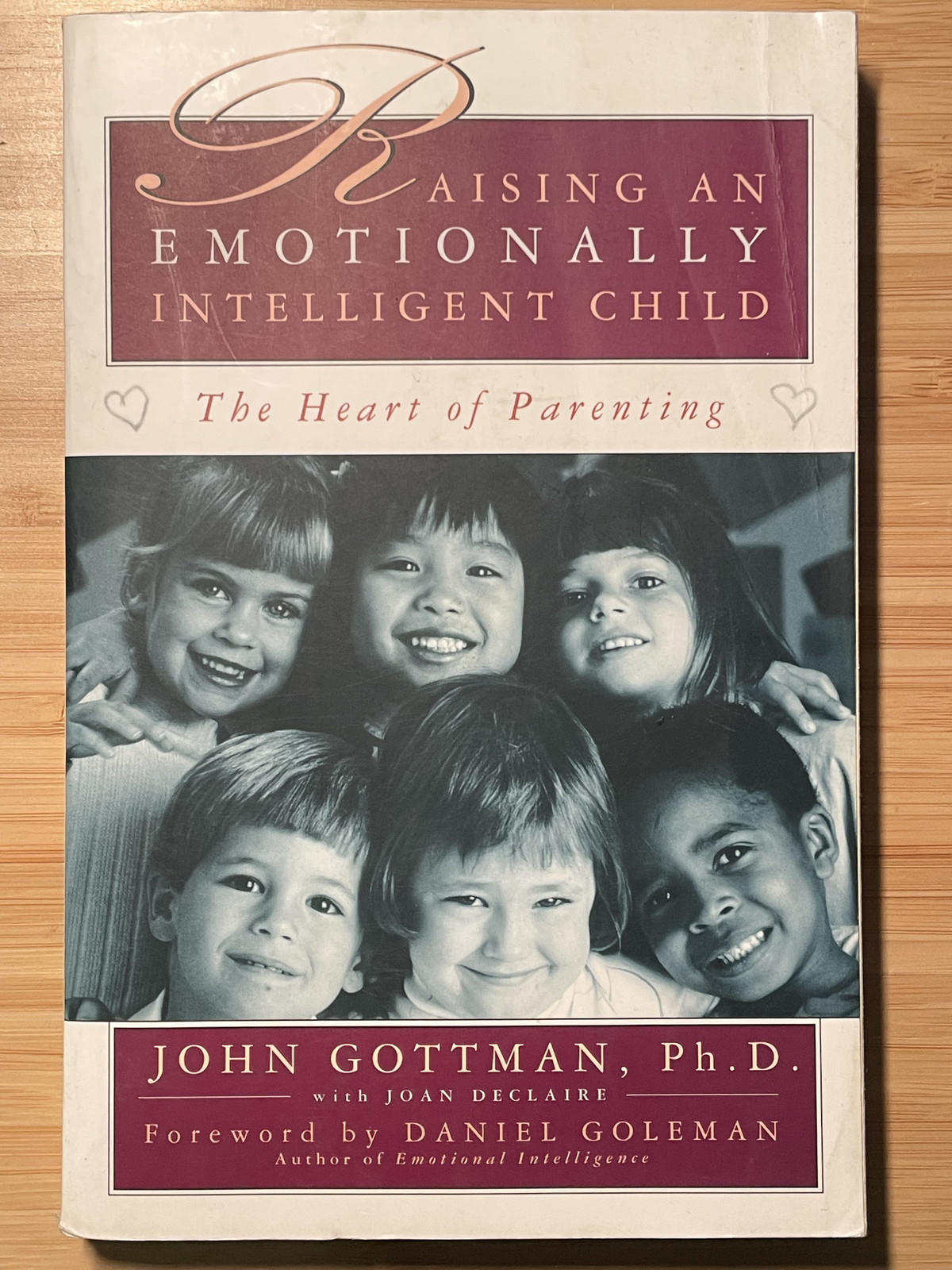 RAISING AN EMOTIONALLY INTELLIGENT CHILD John Gottman, Ph.D. with Joan Declaire