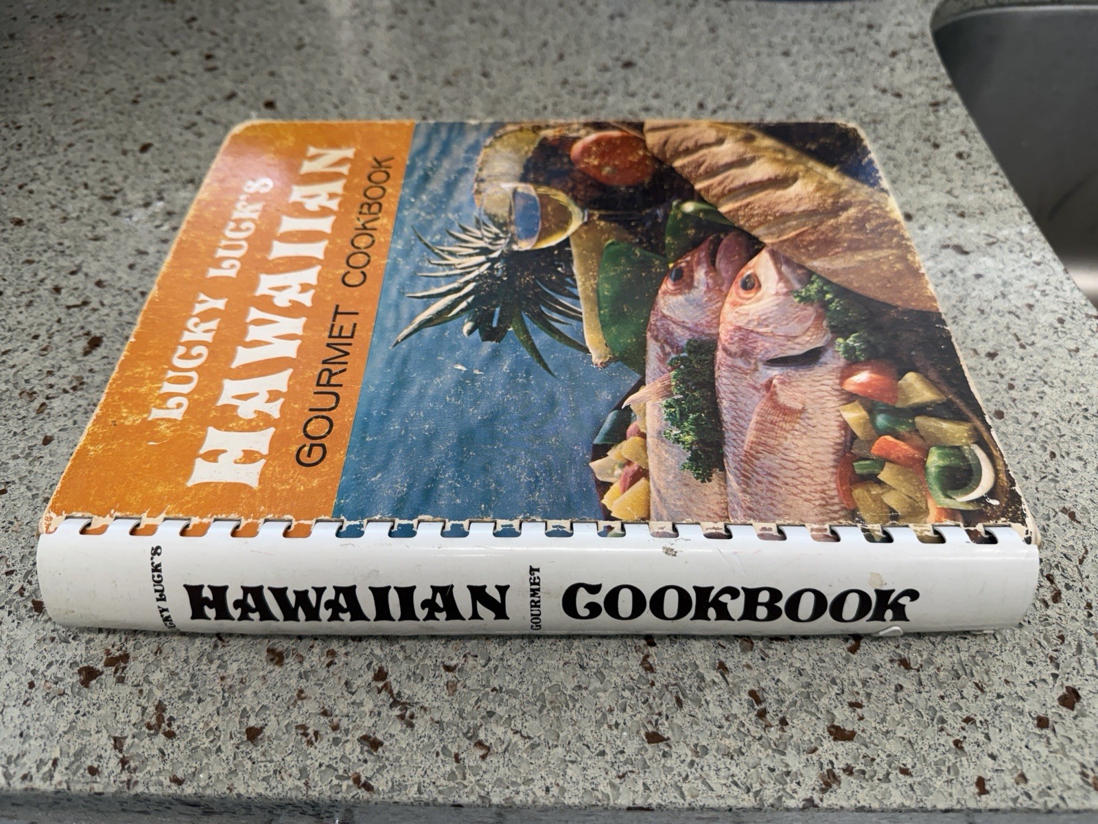 First Printing of Lucky Luck’s Hawaiian Gourmet Cookbook. 332 Pages. Used. Good.