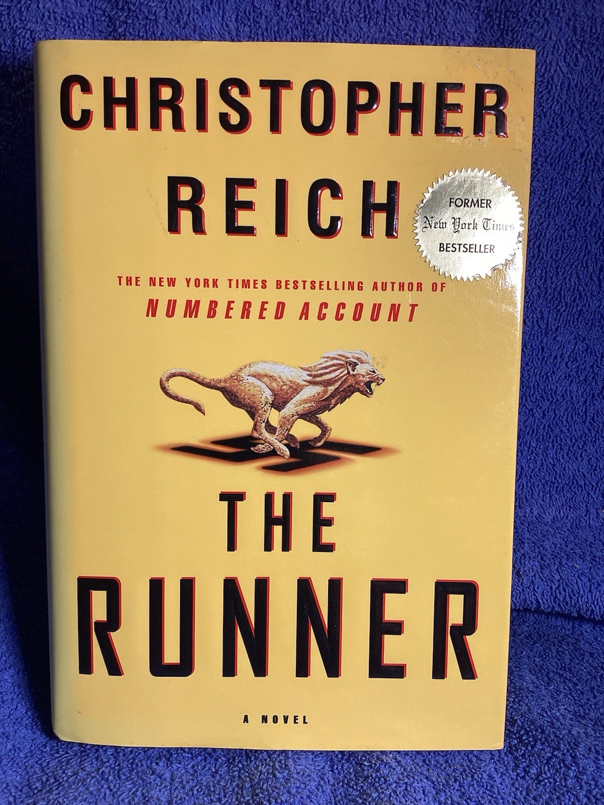 The Runner Christopher Reich Published By DeLacorte Press 2000. 440 Pages.