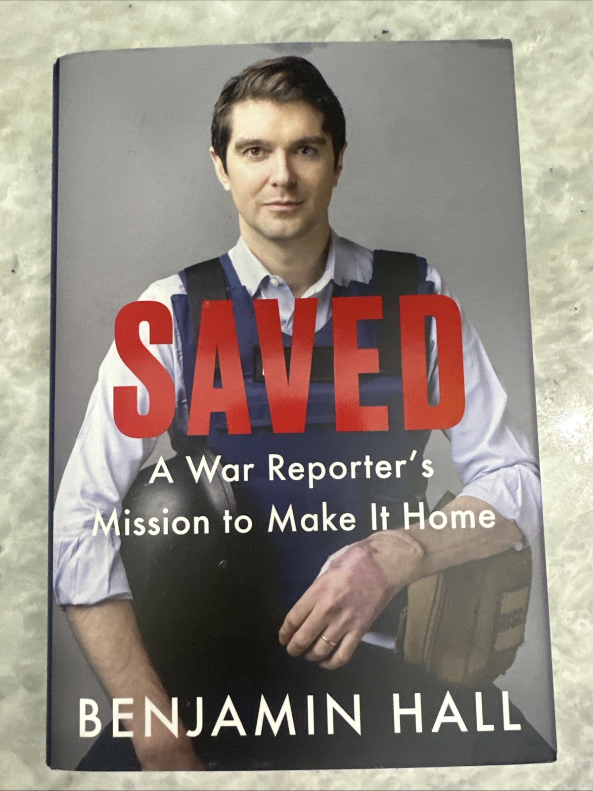 Saved : A War Reporter’s Mission to Make It Home by Benjamin Hall. 2023