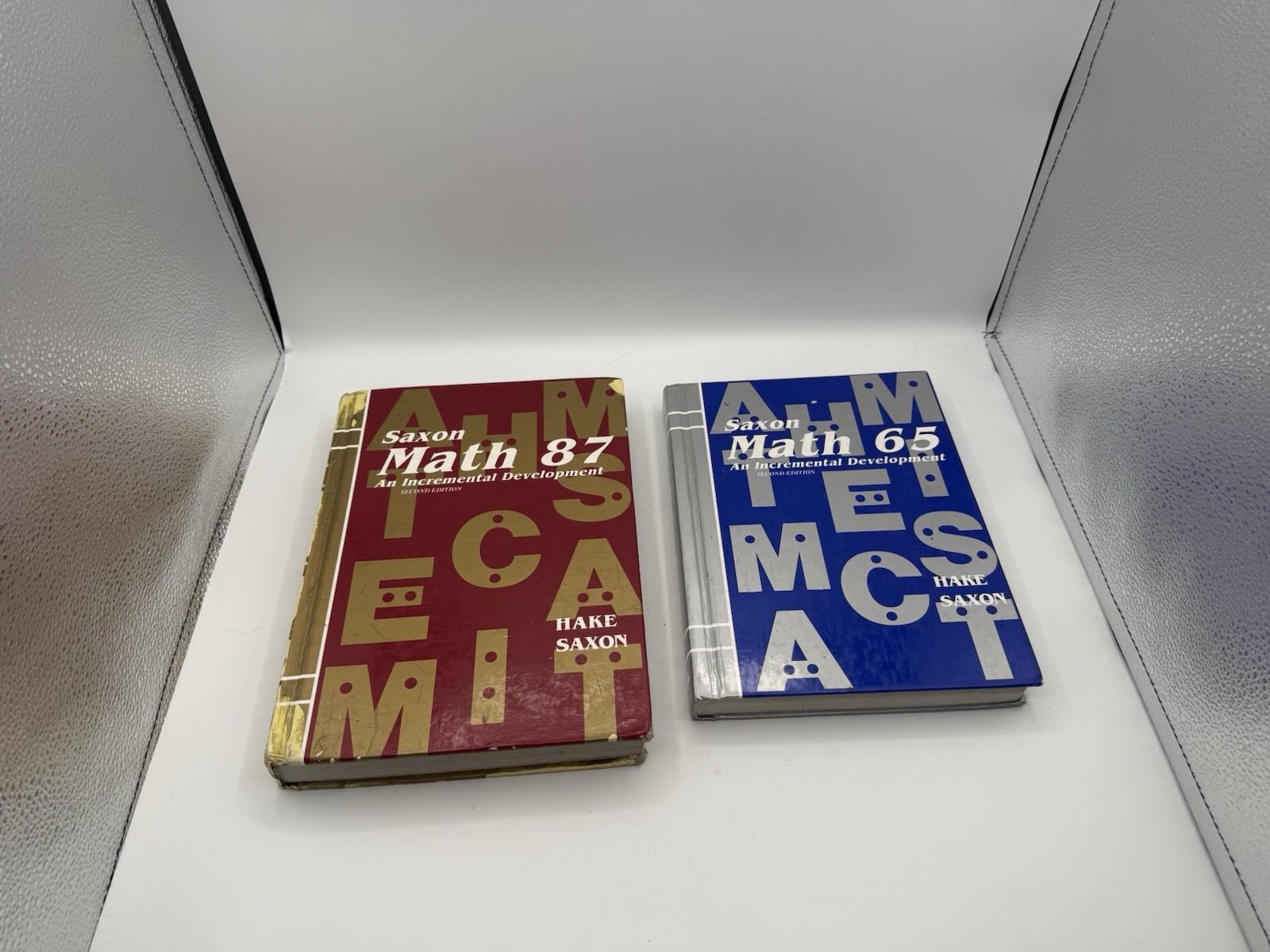 Saxon Math 87 & 65 An Incremental Development Stephen Hake LOT OF TWO (2) Books